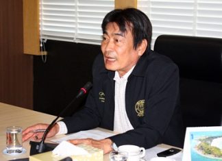 Deputy Mayor Ronakit Ekasingh presides over a city hall meeting to prepare for this year’s bed race.